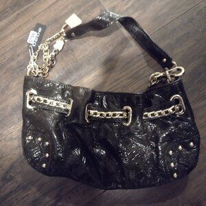 Womens Bebe purse in good condition retails new for over $100
